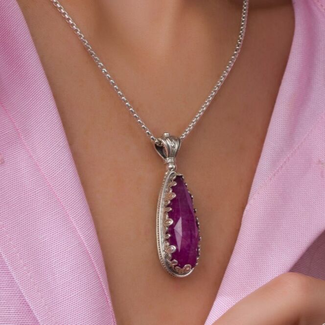 Pendant in sterling silver with doublet stone 10x30mm teardrop and a tiny garnet in the top.Aegean colors big teardrop pendant in Sterling Silver
