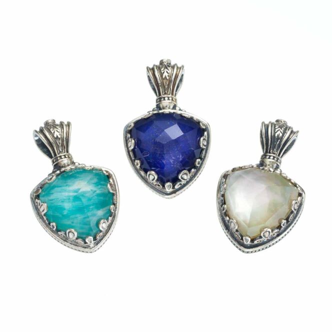 Pendant in sterling silver with doublet stone 14x14mm and a tiny garnet in the top.Aegean colors pendant in Sterling Silver