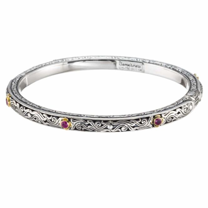 Bracelet in Sterling Silver and 18K solid Yellow Gold with rubies.