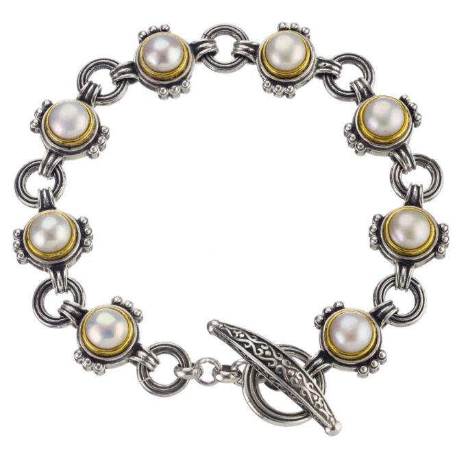 Bracelet in Sterling silver with gold plated parts and freshwater pearls.Semeli bracelet in Sterling Silver with Gold Plated parts