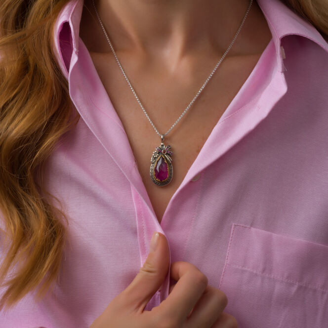 zircon stones and doublet stone 10x20mm teardrop.Dione Teardrop pendant in Sterling Silver with Gold Plated Parts
